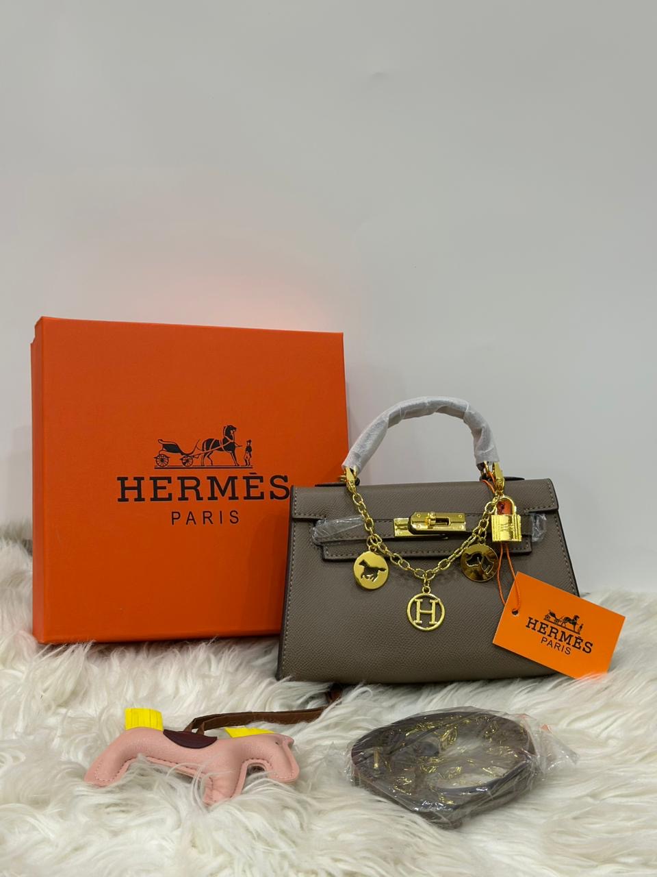 Hermes kelly with Brand Box and Charms