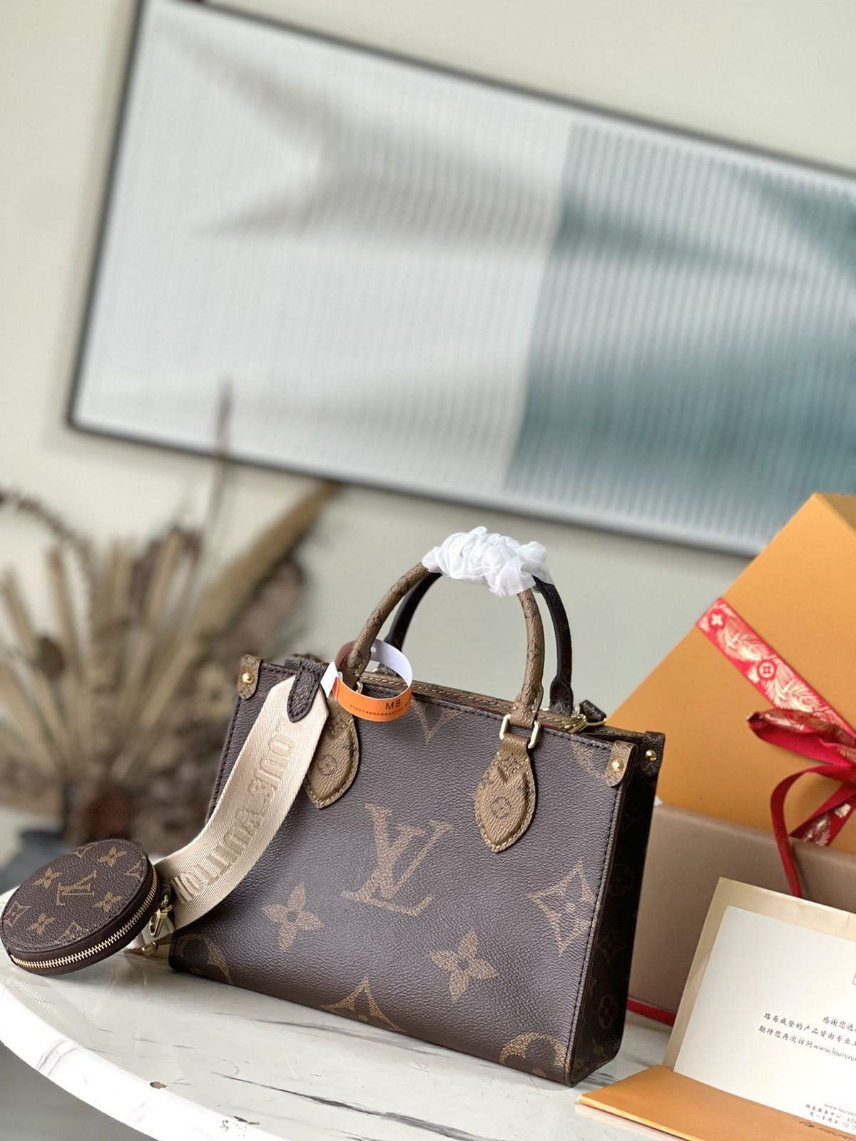 LV OnTheGo PM Bag with brand box