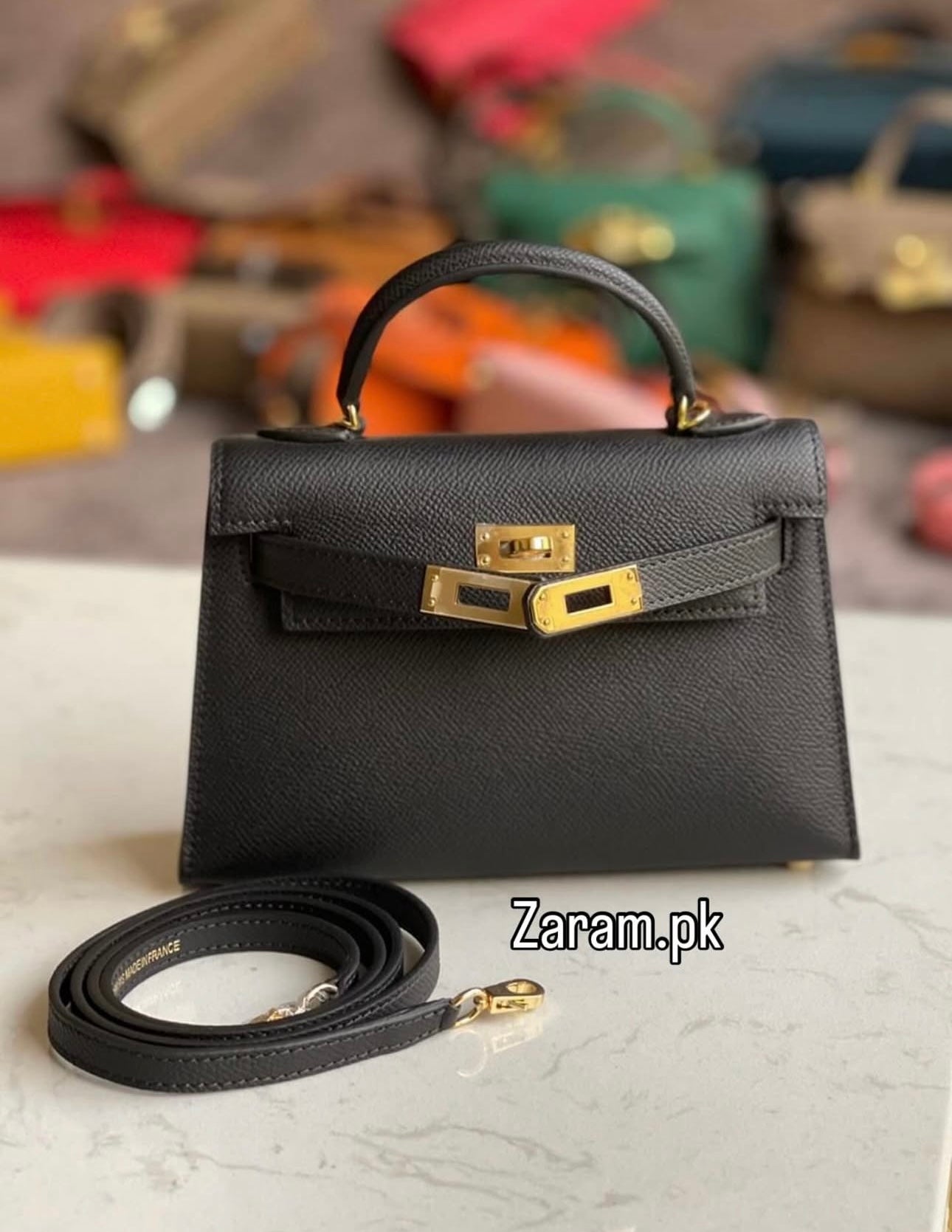 Hermes kelly with Brand Box and Charm